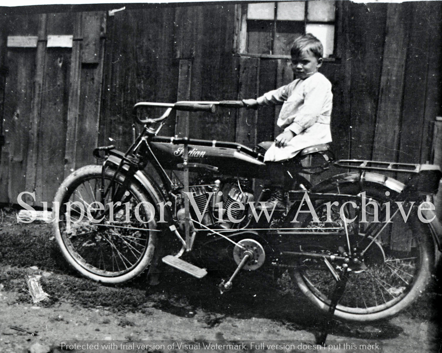 Small Boy on Indian Motorcycle