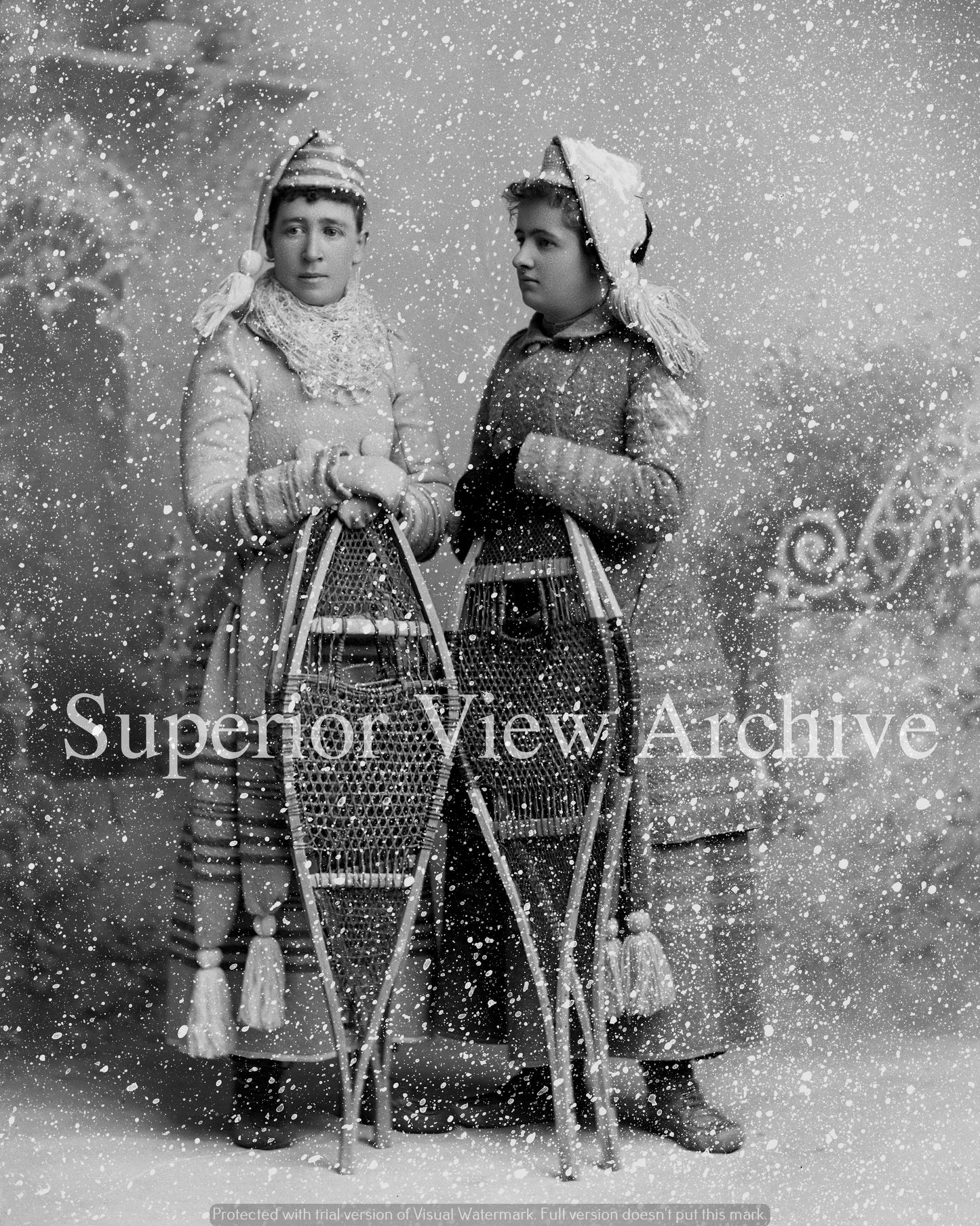 Women Posing with Snowshoes