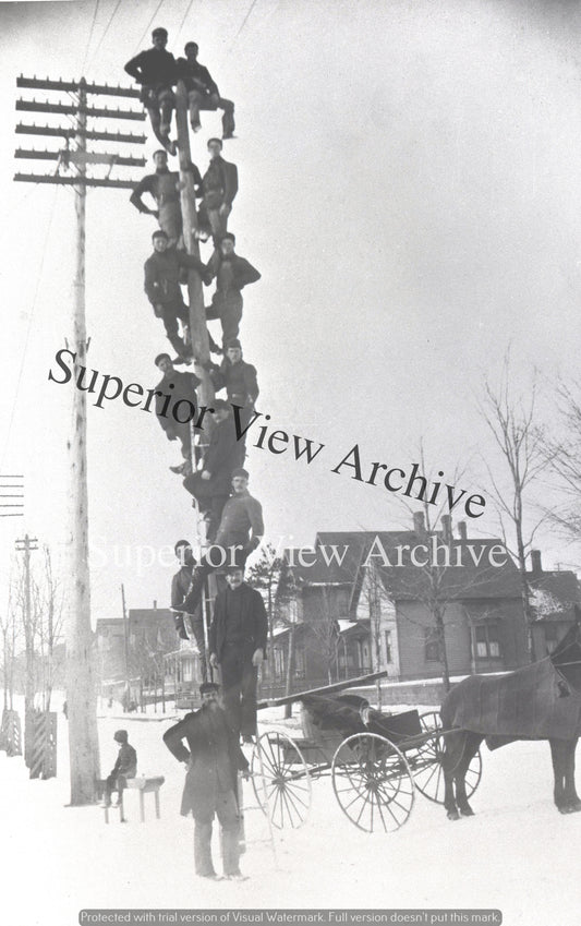 Men on a Telephone Pole